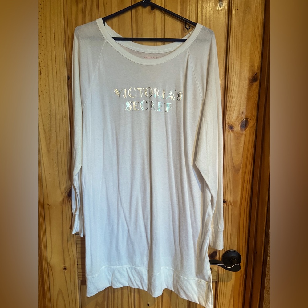 Victoria’s Secret long sleeve shirt white top 
With silver chrome letting large